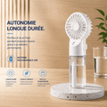 Ventilateur brumisateur portable KØLD tenu en main — vue profil