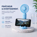 Ventilateur portable USB KØLD utilisé en extérieur — femme souriante